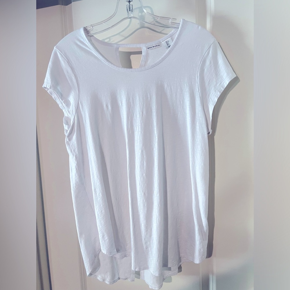 White shirt. Used, in good condition.